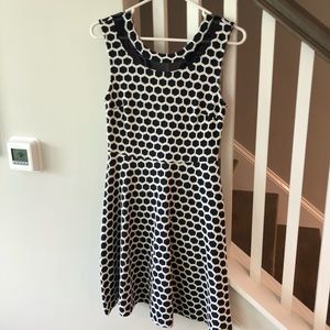 Size small. navy and white polka dotted dress